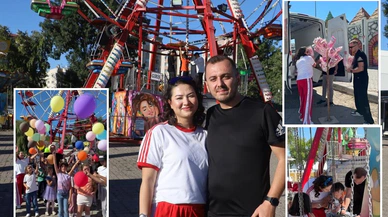 Sivaslı genç çift çocuk özlemini lunaparkta yaşattılar